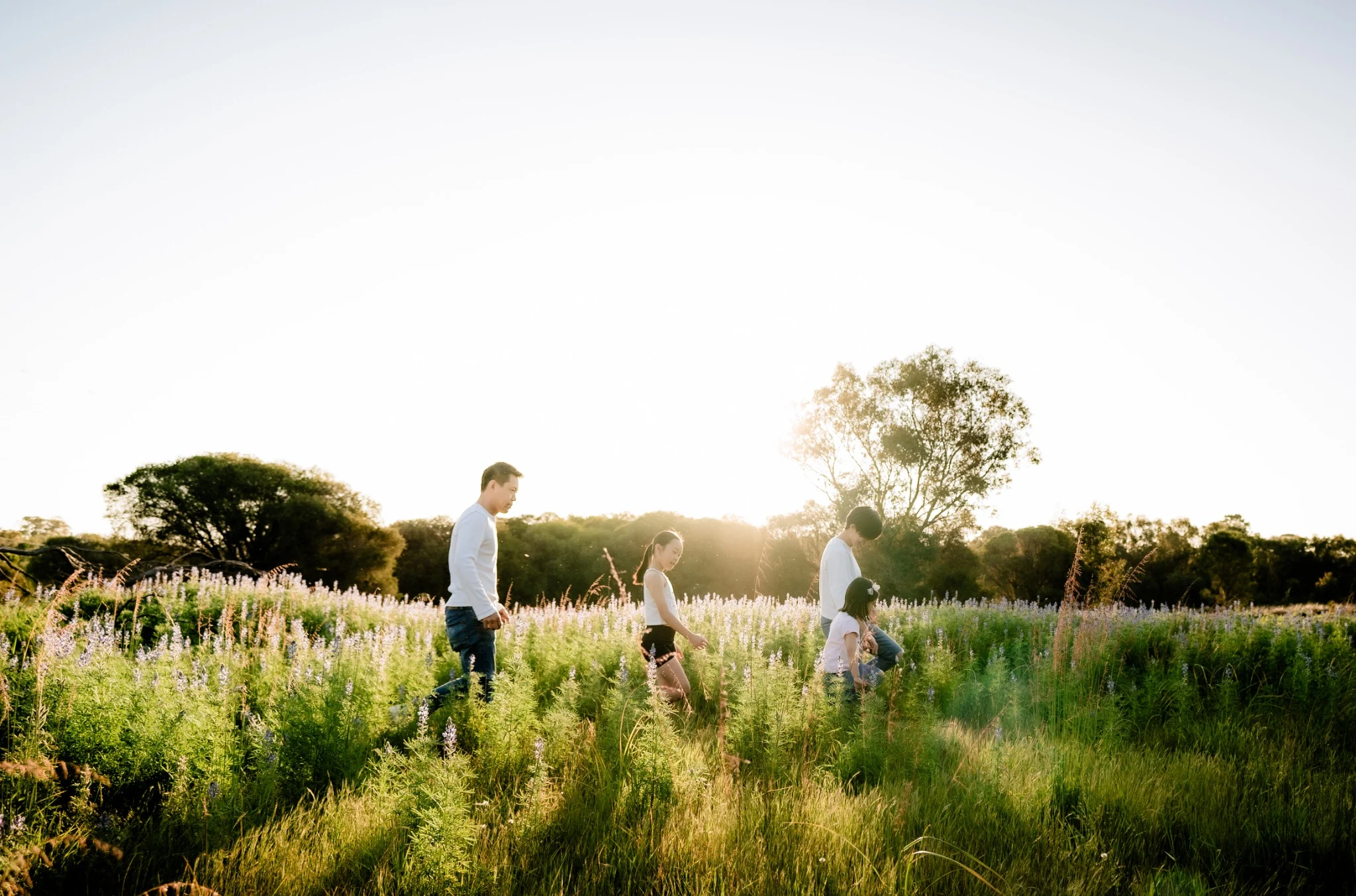 Family walking together at Bibra Lake during a Perth family photography session