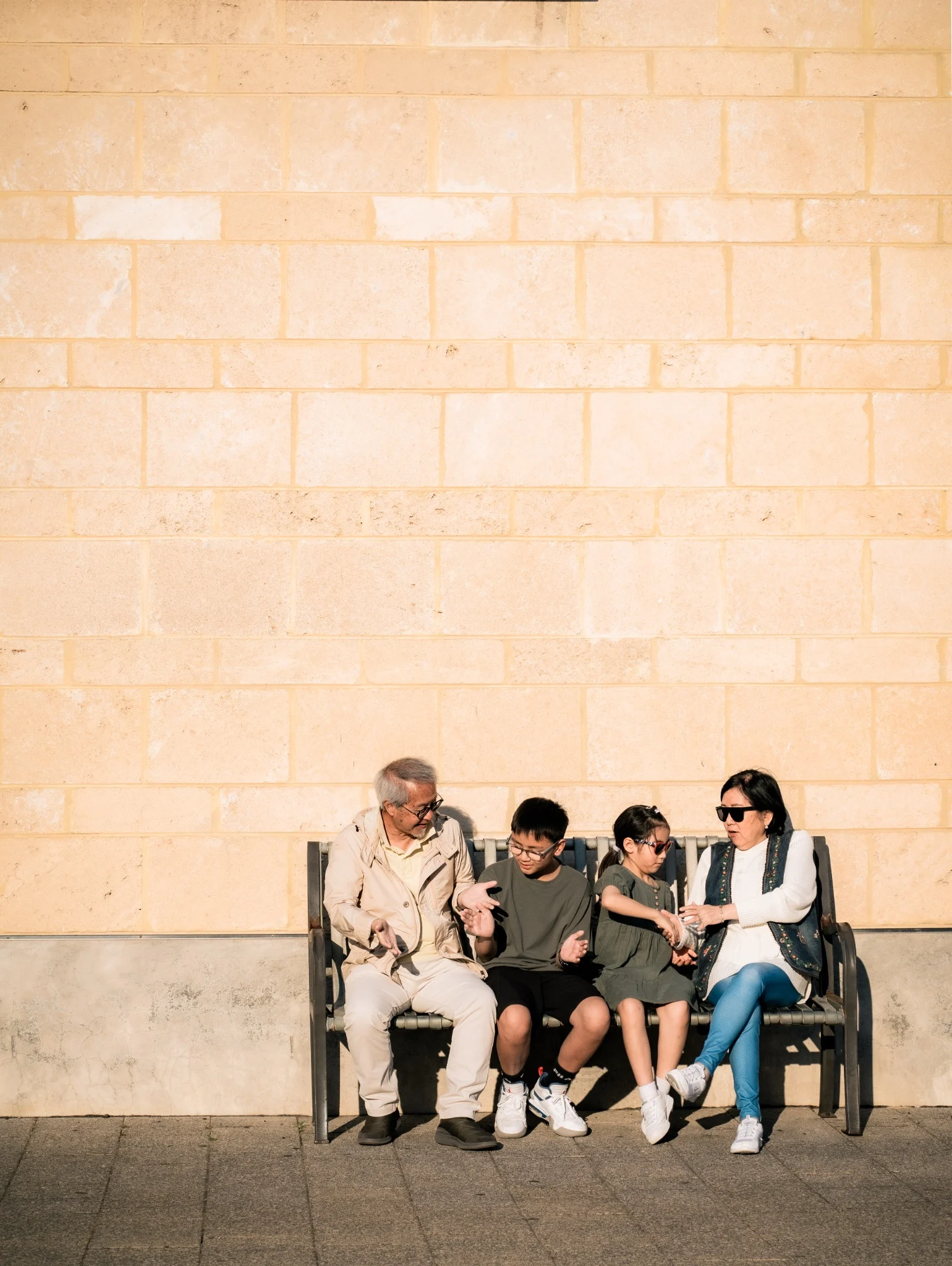 Three generations of The Chan's Family sitting together in Fremantle