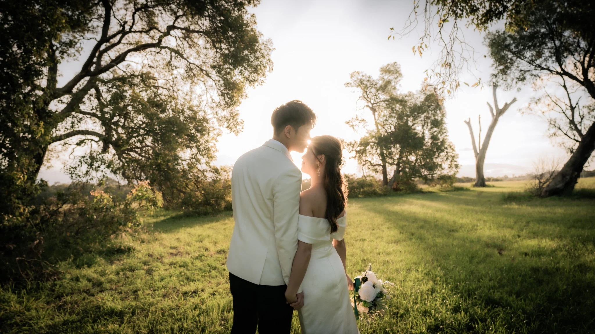 Sharon and Sam embracing at sunset at Perry's Paddock in Perth, Western Australia